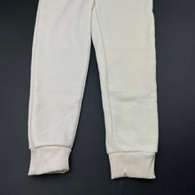 Load image into Gallery viewer, Girls cream, fleece lined track pants, elasticated, Inside leg: 43.5cm, EUC, size 6,