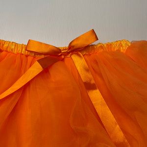 Girls lined, orange tulle skirt, elasticated, W: 27cm across unstretched, EUC, size 8-10,  