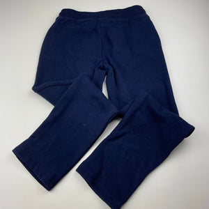 Girls Target, navy fleece lined track pants, elasticated, Inside leg: 55cm, light mark right knee, FUC, size 7,  
