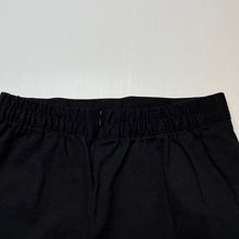 Load image into Gallery viewer, Girls black, stretchy denim skirt, elasticated, no labels, L: 37.5cm, W: 32 across unstretched, EUC, size 12-14,  