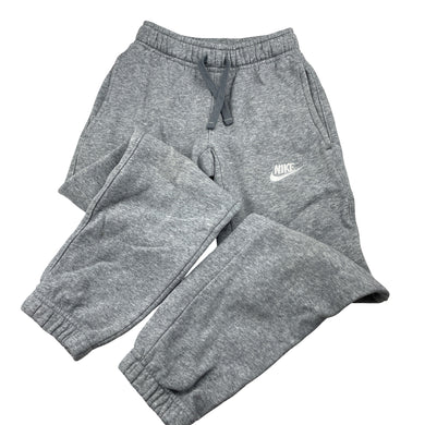 Unisex Nike, fleece lined track pants, elasticated, Inside leg: 54cm, light marks on knees, FUC, size 6-7,  