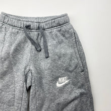 Load image into Gallery viewer, Unisex Nike, fleece lined track pants, elasticated, Inside leg: 54cm, light marks on knees, FUC, size 6-7,  