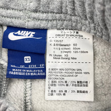 Load image into Gallery viewer, Unisex Nike, fleece lined track pants, elasticated, Inside leg: 54cm, light marks on knees, FUC, size 6-7,  