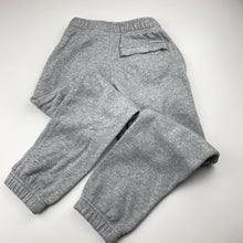 Load image into Gallery viewer, Unisex Nike, fleece lined track pants, elasticated, Inside leg: 54cm, light marks on knees, FUC, size 6-7,  