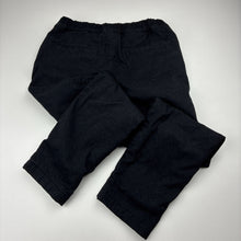 Load image into Gallery viewer, Boys Uniqlo, fleece lined black stretch cotton pants, elasticated, Inside leg: 47.5cm, GUC, size 6,  