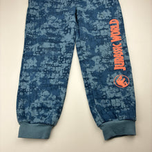 Load image into Gallery viewer, Boys Jurassic World, fleece lined track pants, elasticated, Inside leg: 47cm, light mark left leg, FUC, size 6-7,  