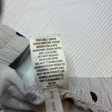 Load image into Gallery viewer, Girls Target, viscose / linen skirt, elasticated, L: 34cm, FUC, size 7,  