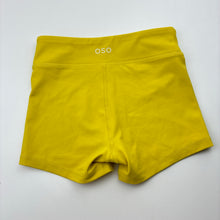 Load image into Gallery viewer, Girls CHASING OSO, yellow dance / gymnastics shorts, EUC, size 8,