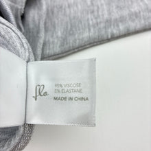 Load image into Gallery viewer, Girls Flo, stretchy cropped long sleeve top, light mark lower front, FUC, size 6,