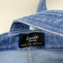 Load image into Gallery viewer, Girls Bardot Junior, blue stretch denim overalls dress / pinafore, small mark on front, FUC, size 5, L: 53cm
