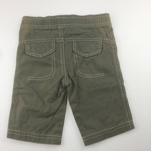 Load image into Gallery viewer, Boys Target, khaki cotton pants, embroidered dinosaur, EUC, size 000